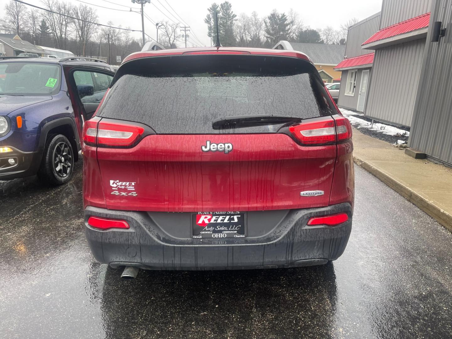 2014 Red /Black Jeep Cherokee Latitude 4WD (1C4PJMCB7EW) with an 2.4L I4 DOHC 16V engine, 9-Speed Automatic transmission, located at 11115 Chardon Rd. , Chardon, OH, 44024, (440) 214-9705, 41.580246, -81.241943 - Photo#8